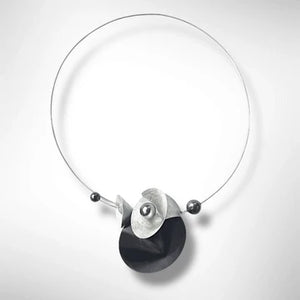 Record Vinyl is the Centerpiece of this Necklace with Recycled Record Vinyl and Simulated Pearls