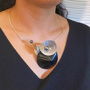 Record Vinyl is the Centerpiece of this Necklace with Recycled Record Vinyl and Simulated Pearls